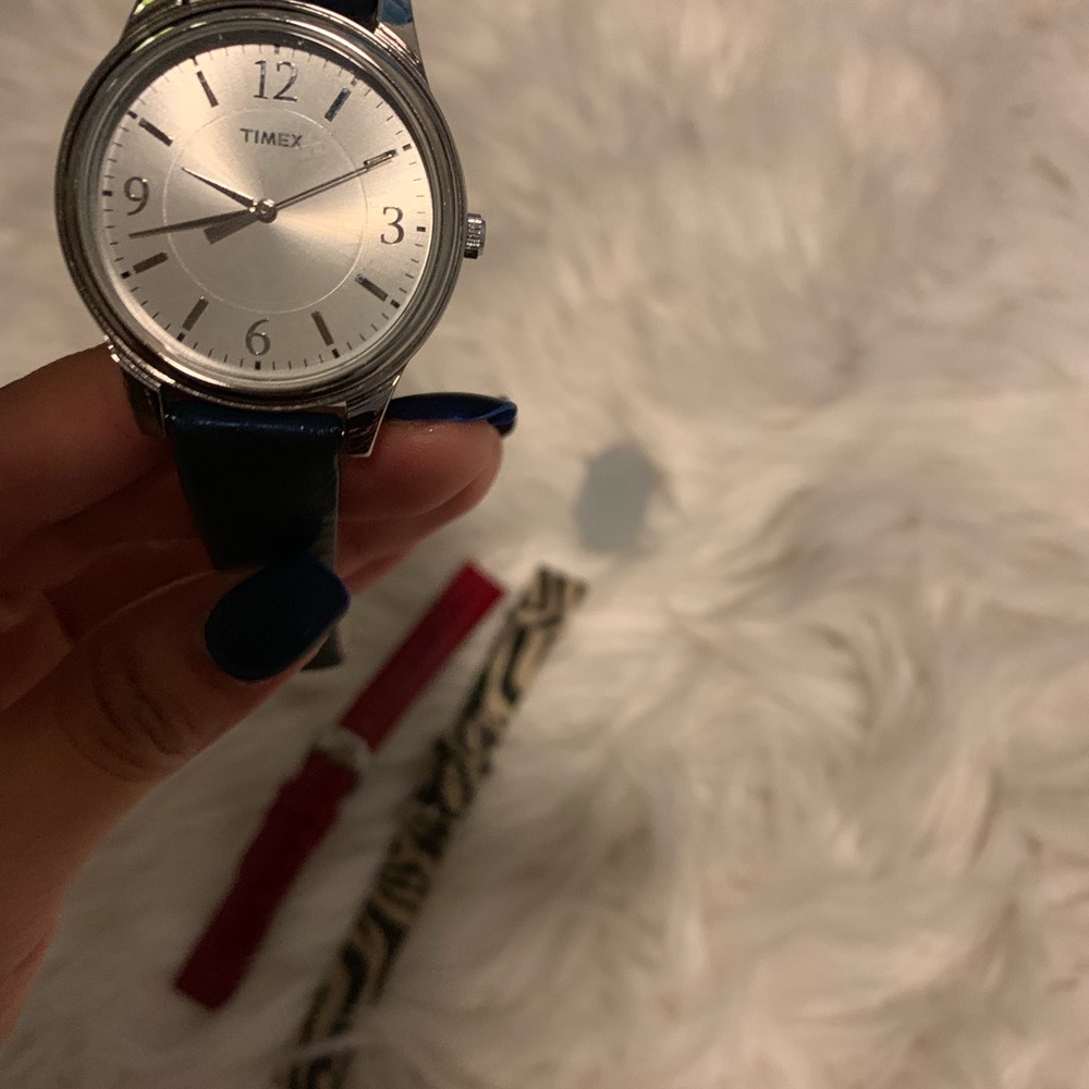 Timex watch with different colored bracelets